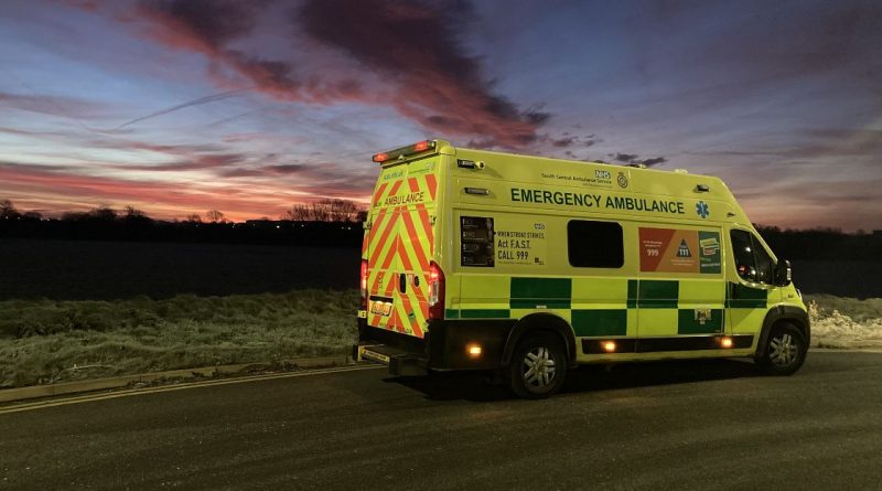 SCAS ambulance parked at dusk on rural road