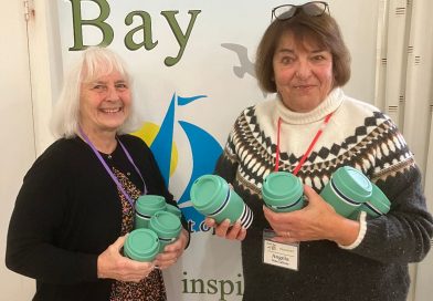 Stokes Bay WI donates mugs to local community