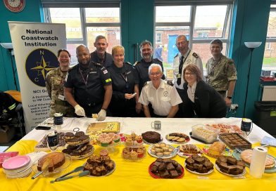 Sultan personnel enjoy tasty treats in NCI cake sale